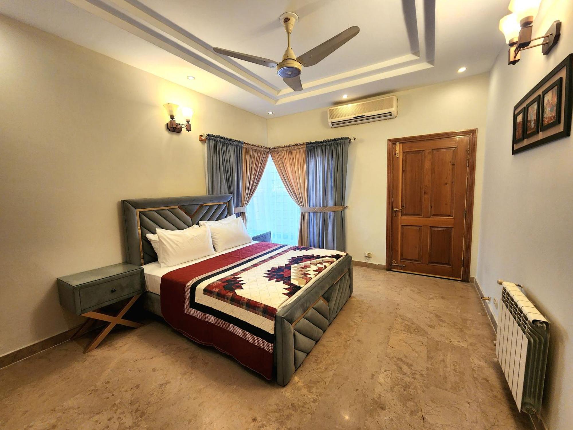 The Millenial Apartments & Suites Bahria Town Rawalpindi Rom bilde