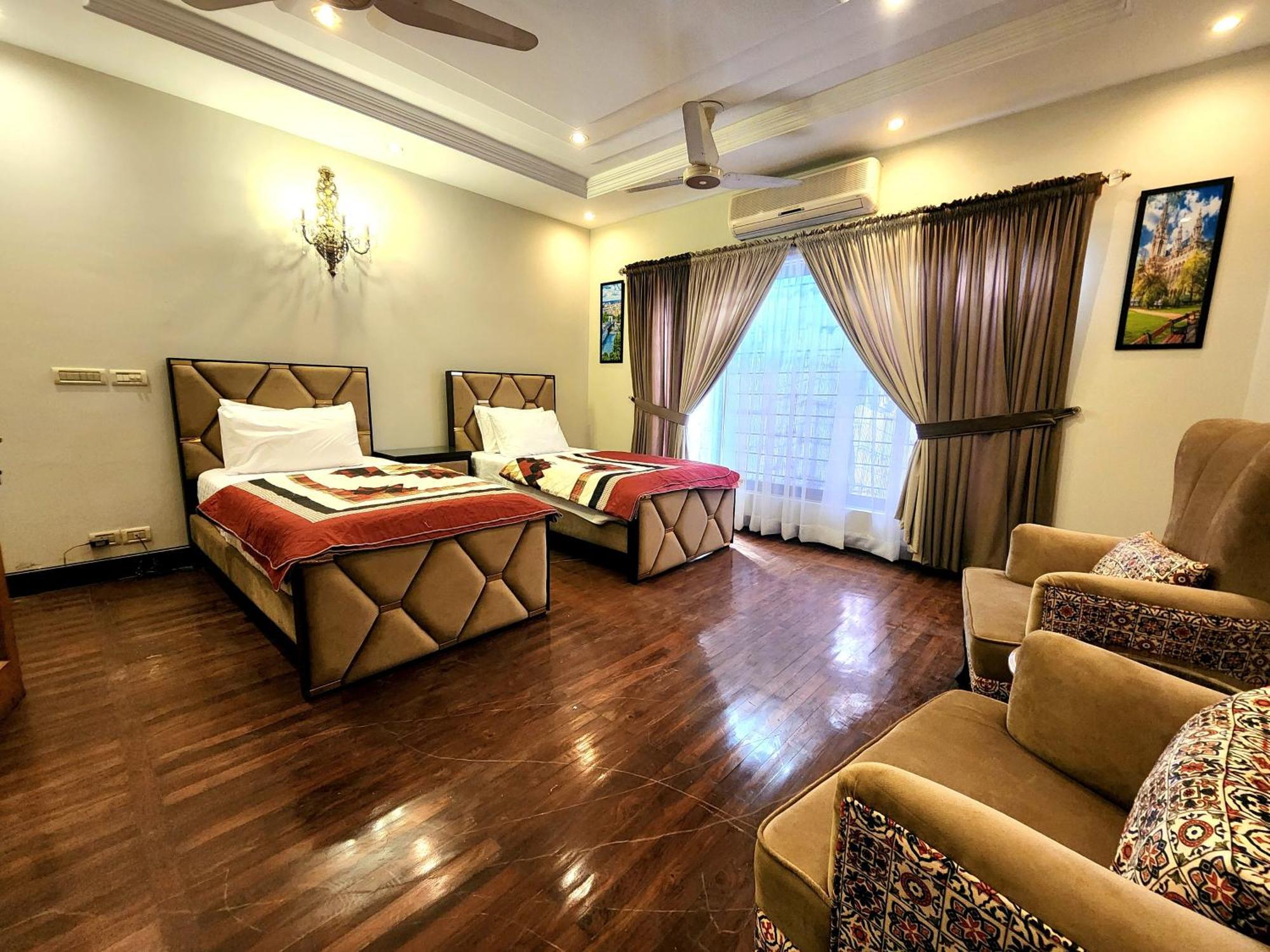 The Millenial Apartments & Suites Bahria Town Rawalpindi Rom bilde
