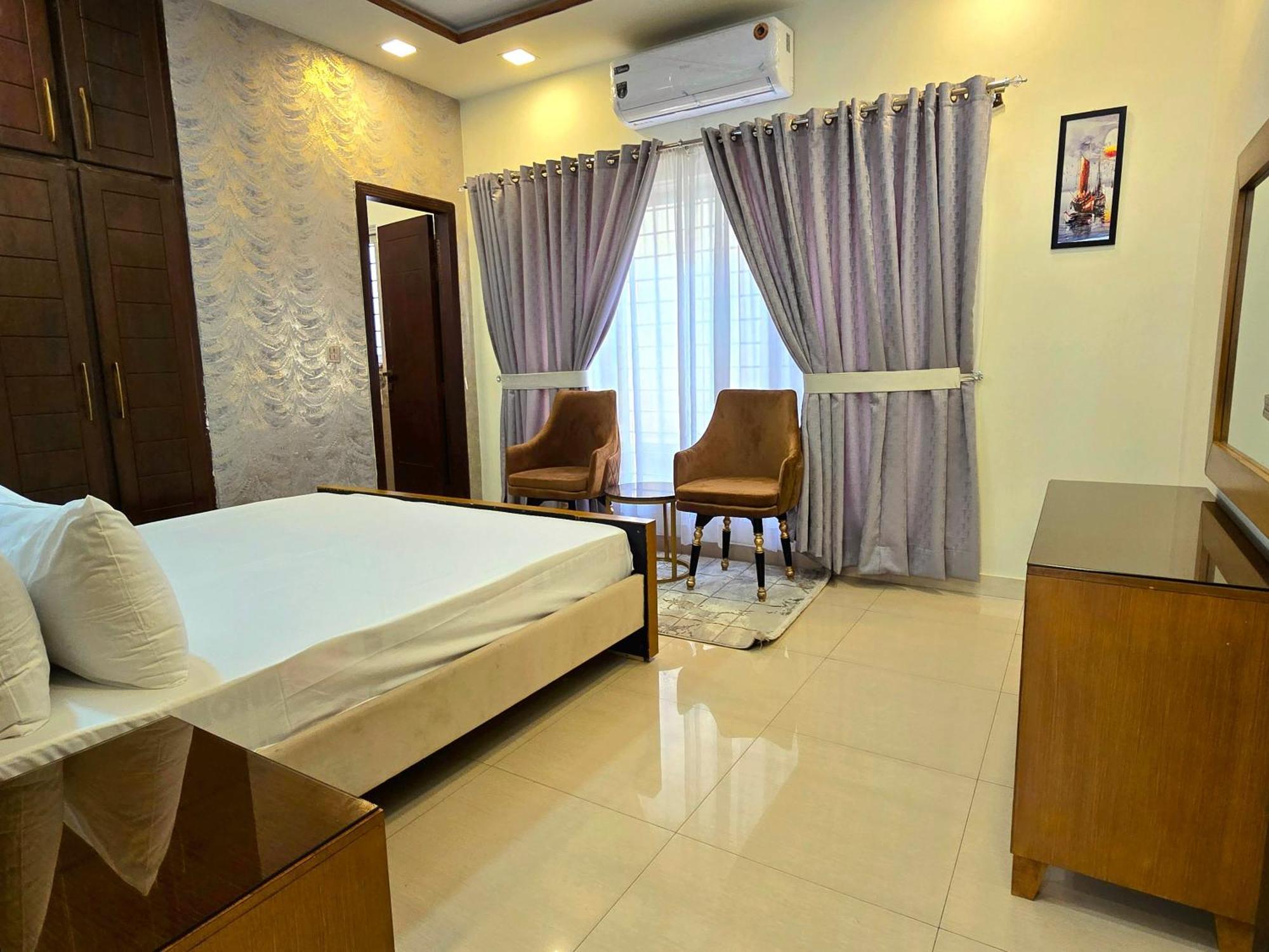 The Millenial Apartments & Suites Bahria Town Rawalpindi Rom bilde